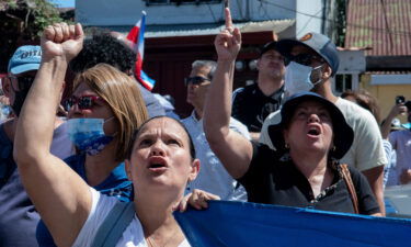 People take part in a demonstration against the Covid-19 vaccination mandate for children in San Jose