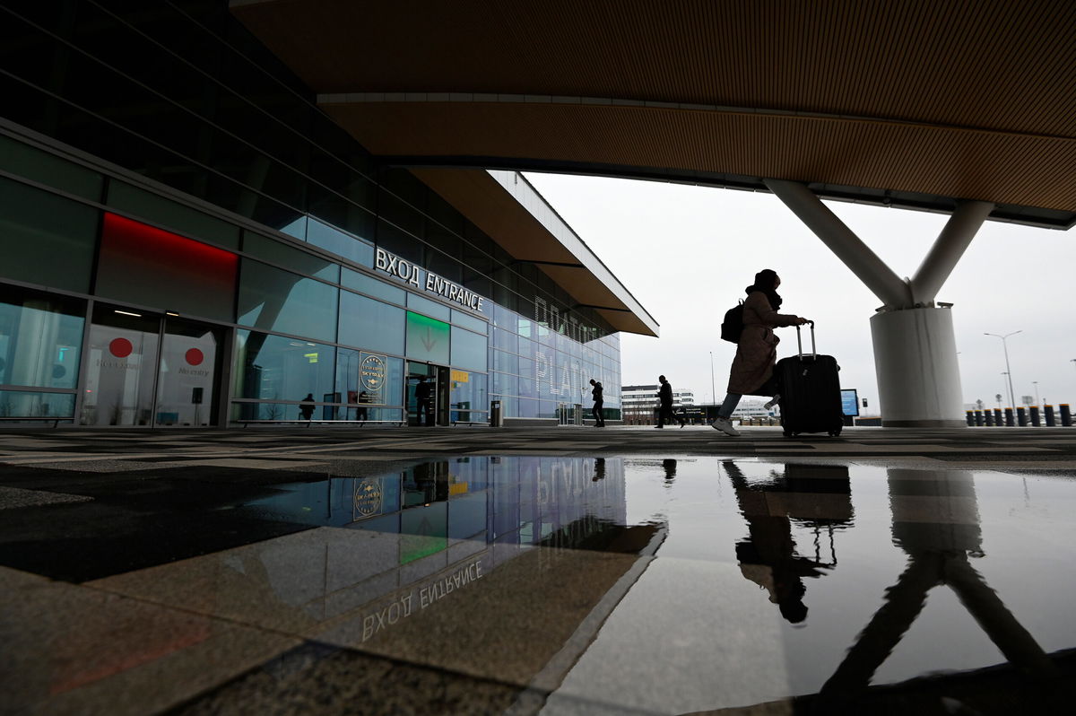 <i>Maksim Blinov/Sputnik/AP</i><br/>A passenger exits Platov International Airport in Rostov-on-Don