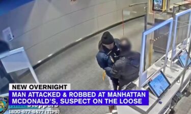 A man is in critical condition after he was beaten and robbed inside a Midtown McDonald's.