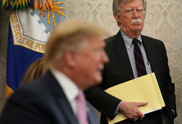 WASHINGTON, DC - APRIL 09: National Security Adviser John Bolton listens to U.S. President Donald Trump speak during a meeting with Egyptian President Abdel-Fattah el-Sisi in the Oval Office of the White House April 9, 2019 in Washington, DC. President El-Sisi is visiting Washington for bilateral talks with President Trump. Trump answered questions from the press about his immigration policy. (Photo by Alex Wong/Getty Images)