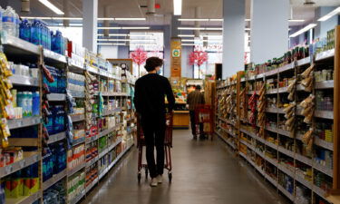 Consumers shop at a grocery store in Washington