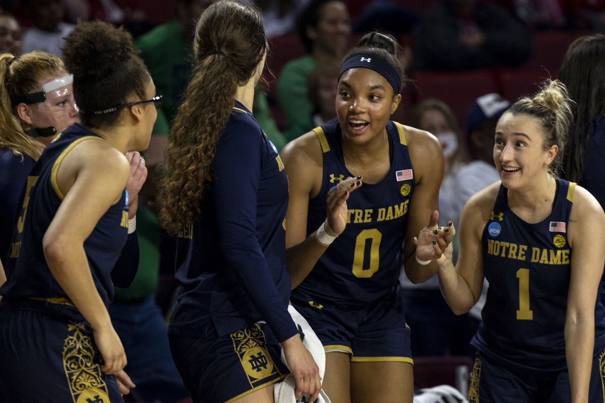 <i>Mitch Alcala/AP</i><br/>Notre Dame celebrates on the sideline against Oklahoma in the NCAA women's college basketball tournament on March 21.