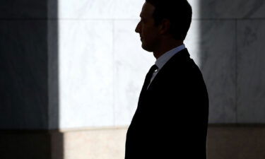 Facebook co-founder and CEO Mark Zuckerberg arrives for testimony before the House Financial Services Committee in the Rayburn House Office Building on Capitol Hill October 23