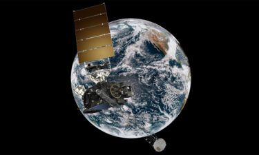 This artist's rendering shows a GOES spacecraft in orbit around Earth.