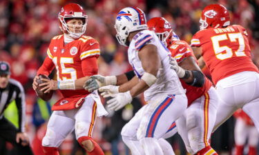 Kansas City Chiefs quarterback Patrick Mahomes looks to pass to the end zone against the Buffalo Bills.