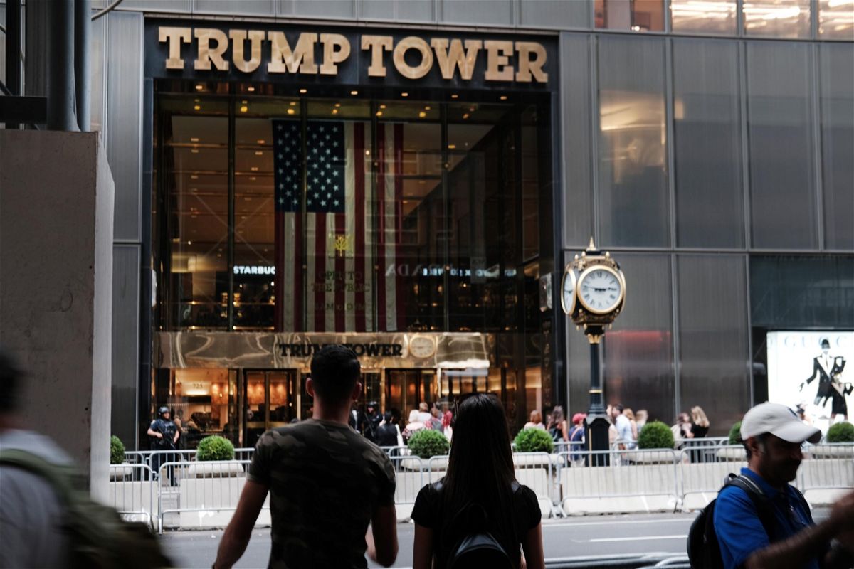 <i>Spencer Platt/Getty Images</i><br/>People walk by Trump Tower in New York City in September 2019. A New York state judge ordered the Trump Organization to comply by April with a subpoena from the New York attorney general.