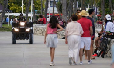 A police officer on an ATV patrols in Miami Beach's famed South Beach