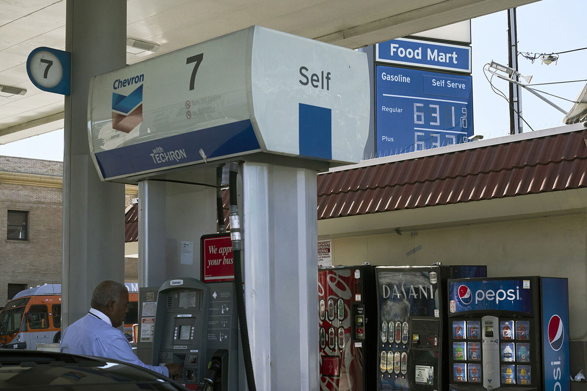 <i>Bing Guan/Bloomberg/Getty Images</i><br/>Oil prices briefly surged to their highest levels since 2008 Thursday morning. A customer is seen here refueling a vehicle at a gas station in Los Angeles on February 28.