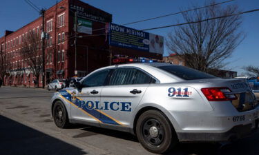 Police at the scene where Louisville mayoral candidate Craig Greenberg was shot in February.