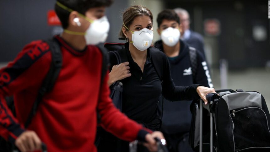 220310144649-01-masks-airport-dulles-file-full-169