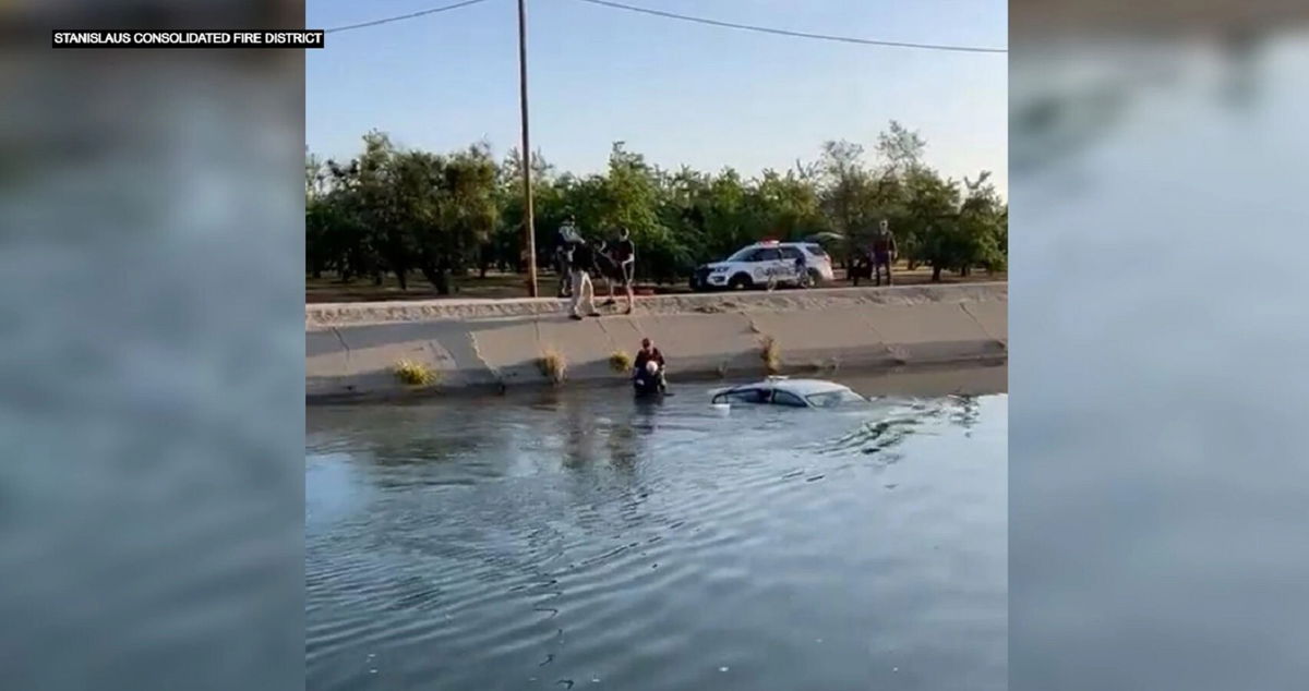 <i>Stanislaus Consolidated FD</i><br/>Crews worked quickly to rescue a driver who crashed into an irrigation canal on Wednesday morning.