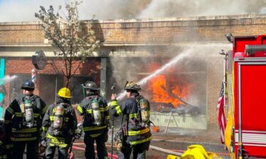 Officials say spilled wax sparked a large fire in downtown Seymour.