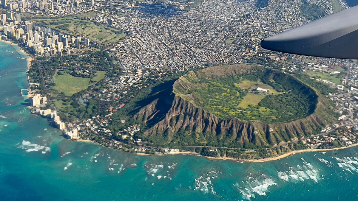 <i>Daniel Slim/AFP/Getty Imges</i><br/>An aerial view from the window of a plane shows Diamond Head crater in Oahu