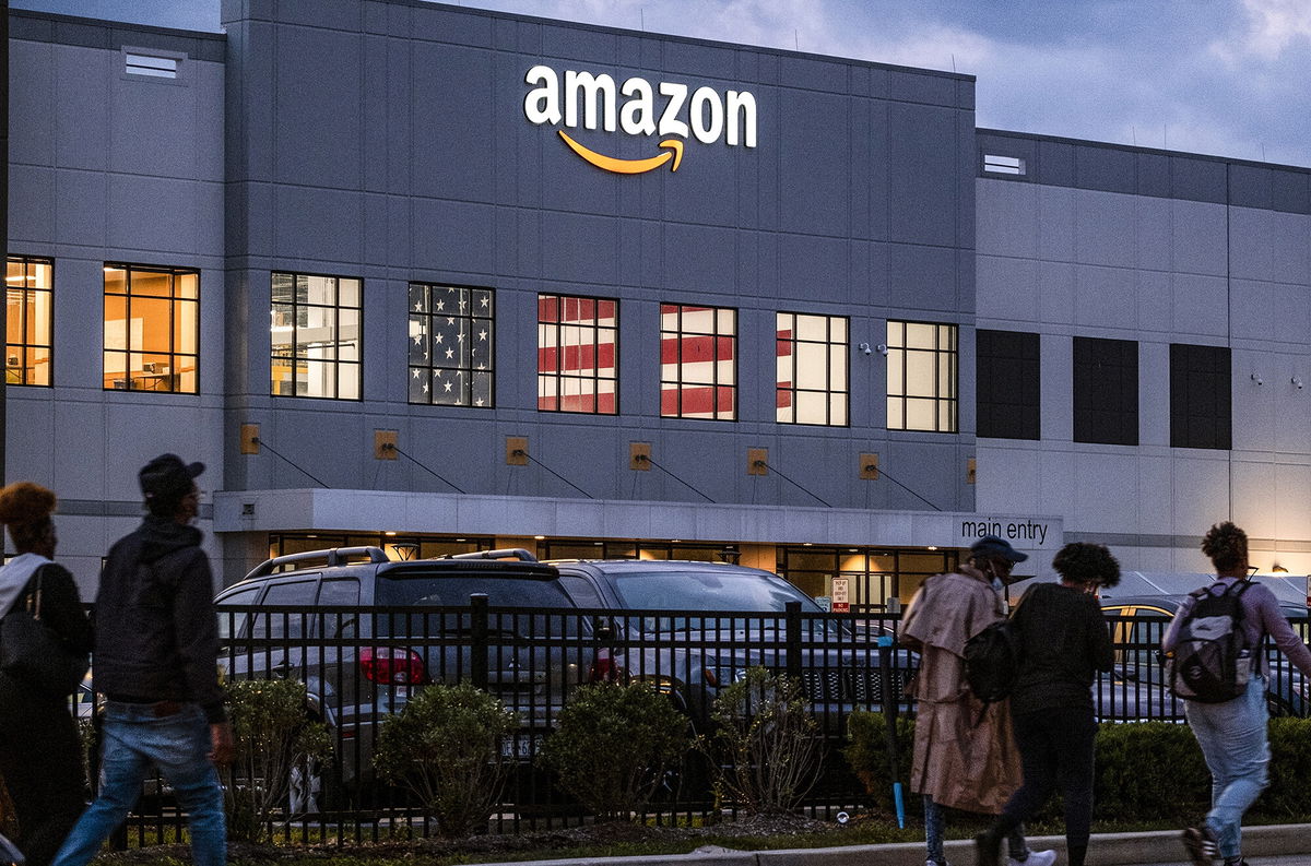 <i>Craig Ruttle/AP</i><br/>People arrive for work at the Amazon distribution center in the Staten Island borough of New York