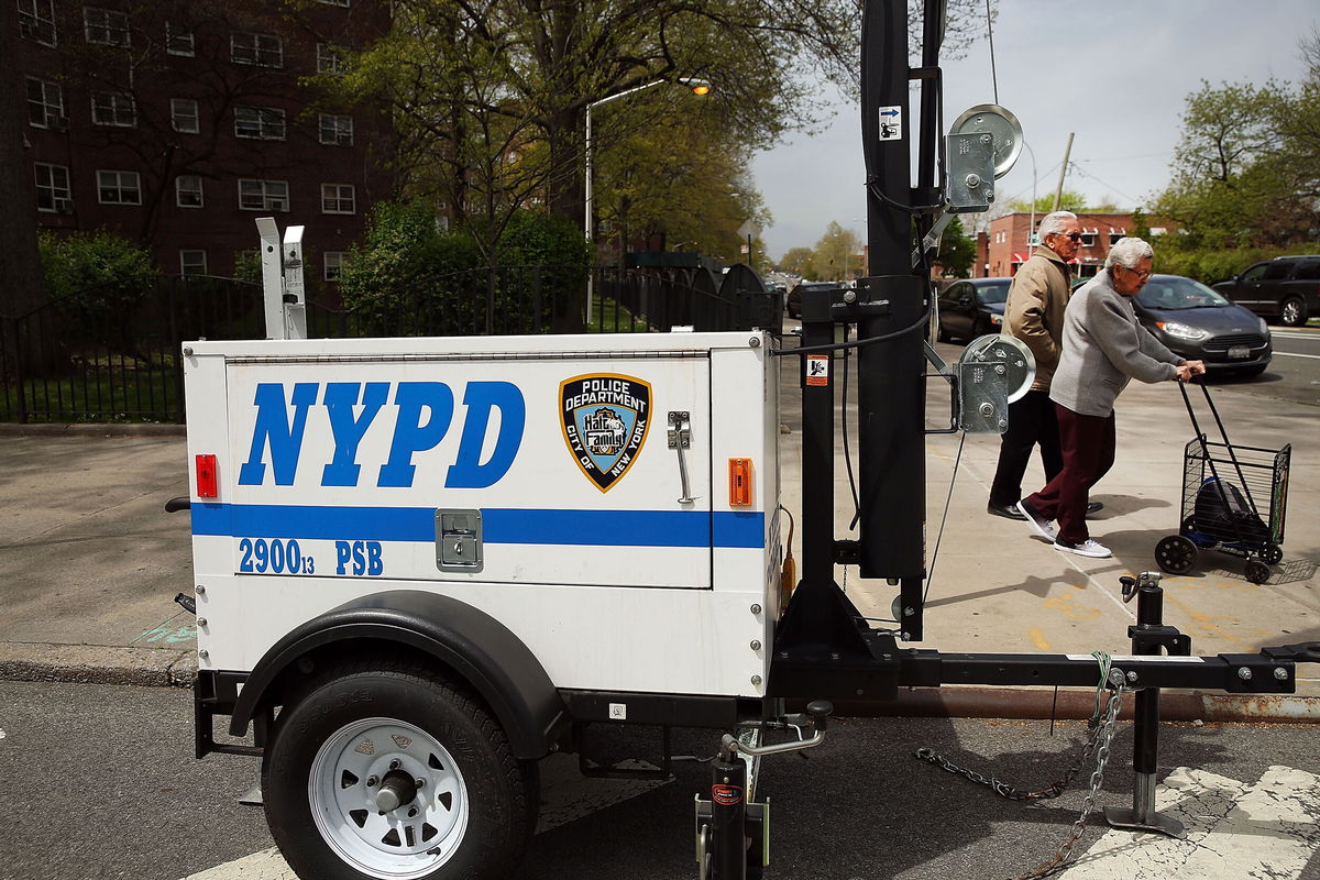 <i>Spencer Platt/Getty Images</i><br/>A mobile lighting unit is set up at a public housing complex in the Bronx in 2016.