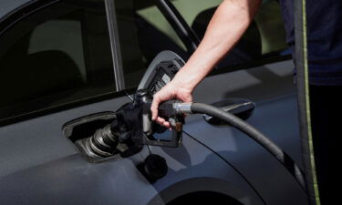 A customer refuels a vehicle at a Mobil gas station in West Hollywood