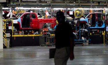 Struggling factories and booming airlines put the Fed in a bind. Pictured is the Nissan's assembly plant