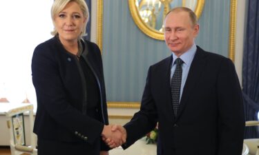 Russian President Vladimir Putin meets Marine Le Pen at the Kremlin in Moscow on March 24