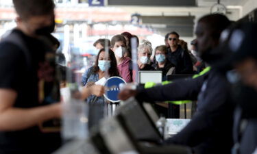 Passengers make their way through Delta Airlines Terminal Two at Los Angeles International Airport on Tuesday