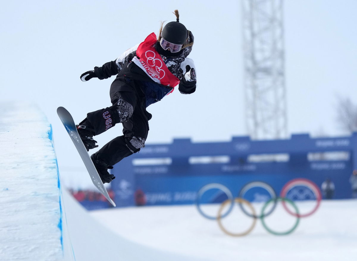 <i>Mao Jianjun/China News Service/Getty Images</i><br/>Chloe Kim performing a trick during the Women's Snowboard Halfpipe Final at the Beijing 2022 Winter Olympics.