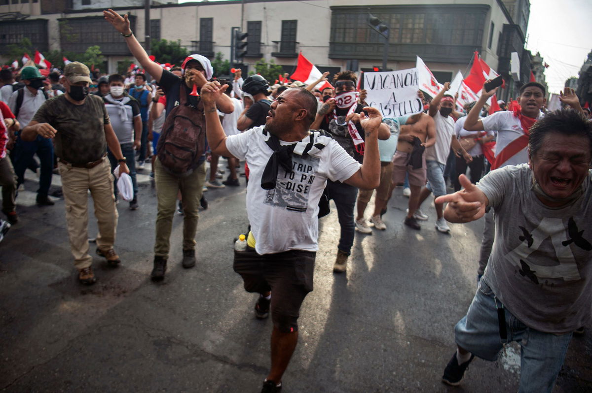 <i>Ernesto Benavides/AFP/Getty Images</i><br/>Demonstrators protest Peruvian President Pedro Castillo's government in Lima on Tuesday.