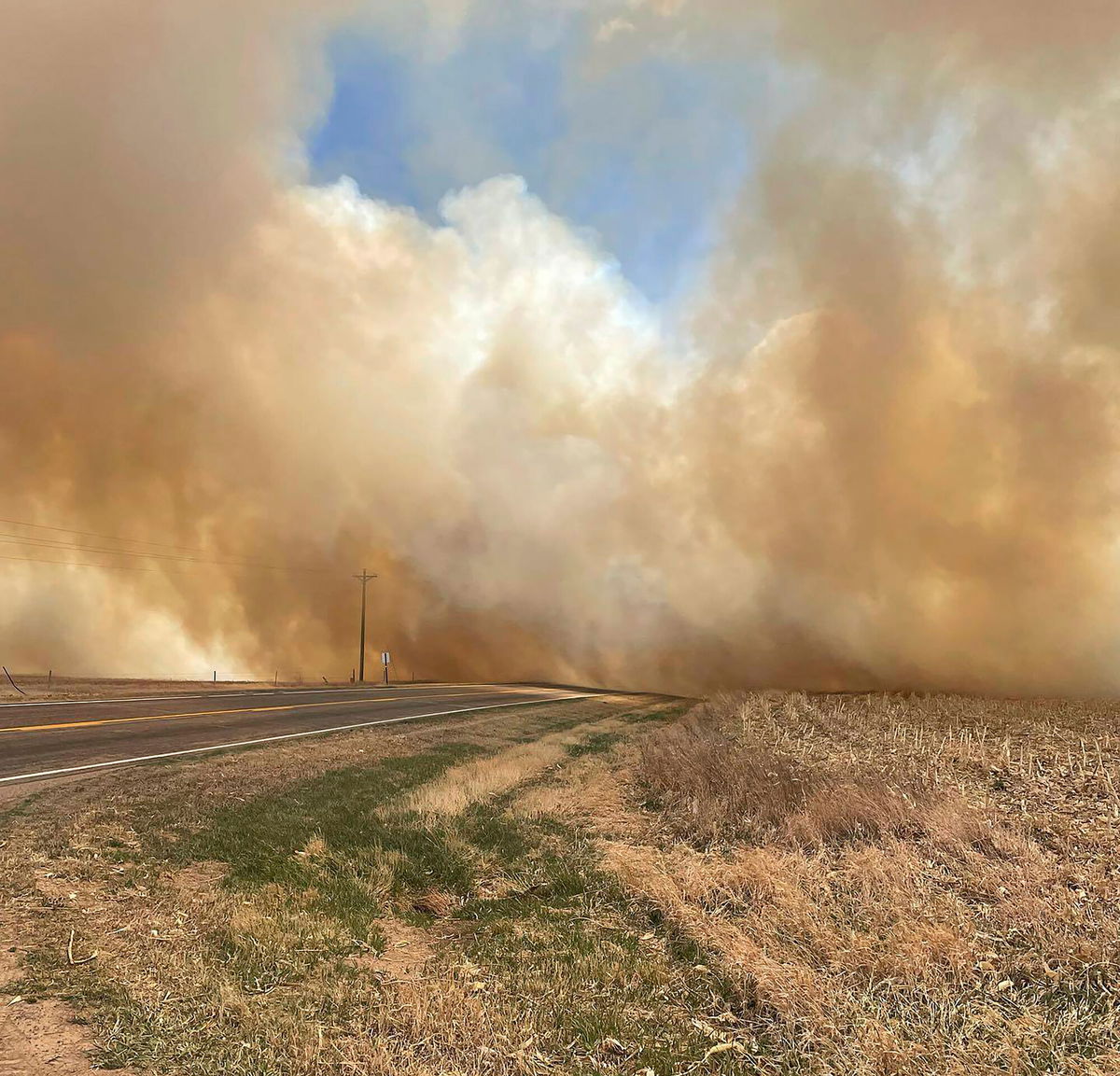 <i>Nebraska State Patrol/AP</i><br/>Smoke from a wildfire seen from near Cambridge