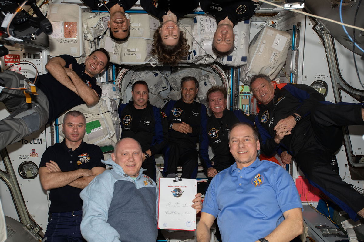 <i>NASA</i><br/>The 11-person crew aboard the International Space Station on April 9.