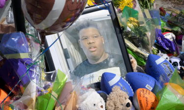 A makeshift memorial for Tyre Sampson is viewed outside the Orlando Free Fall ride at the ICON Park entertainment complex on Sunday