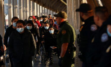 Migrants expelled from the US and sent back to Mexico under Title 42 walk towards Mexico at the Paso del Norte International border bridge on April 1.