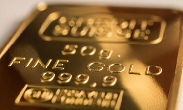 The surface of minted gold bar weighing 50 grams. Gold is still the real hedge in times of uncertainty.