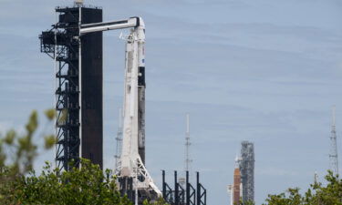 NASA’s Space Launch System (SLS) rocket with the Orion spacecraft aboard is seen atop a mobile launcher at Launch Complex 39B