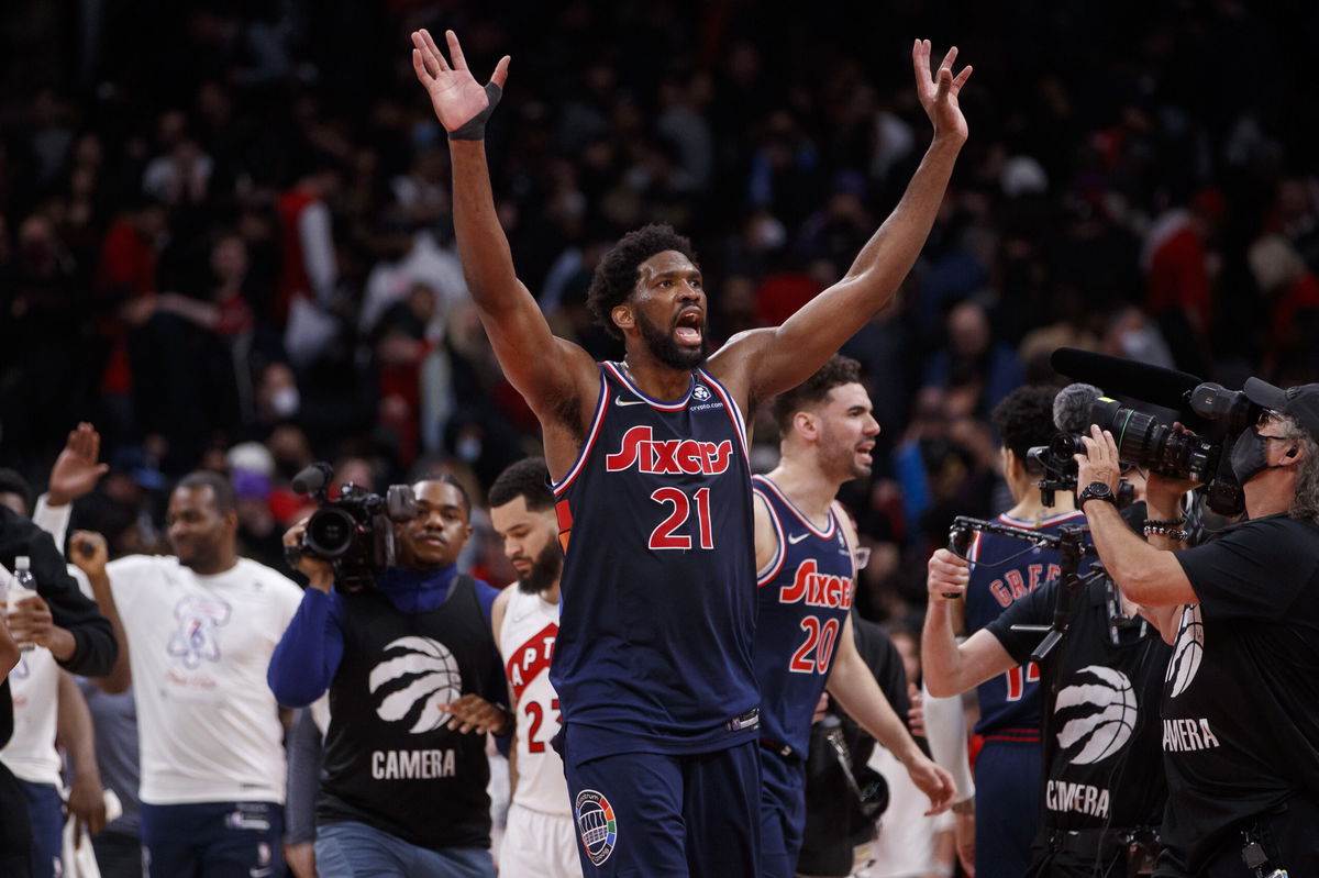 <i>Cole Burston/Getty Images North America/Getty Images</i><br/>Joel Embiid hits the last second game-winning three in OT to give Philadelphia 76ers series lead over Toronto Raptors.