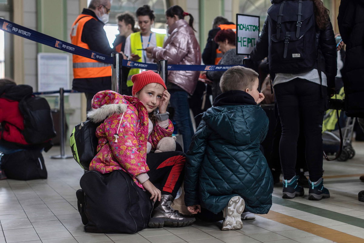 <i>WOJTEK RADWANSKI/AFP/Getty Images</i><br/>Ukrainian refugees at Przemysl railway station in eastern Poland.