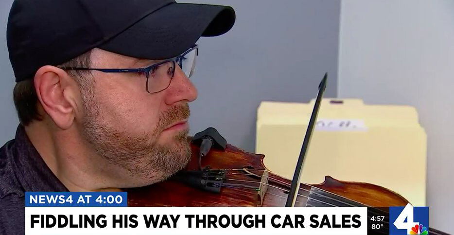 <i>WSMV</i><br/>Scott Johnson plays the fiddle.