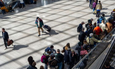 Travelers crowd the Moynihan Train Hall in Pennsylvania Station in New York on March 13. The CDC defended its authority to issue a transportation mask mandate in a brief filed on May 31.