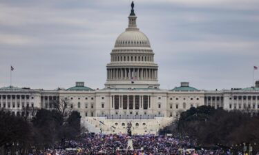 Supporters of President Donald Trump surround the US Capitol on January 6