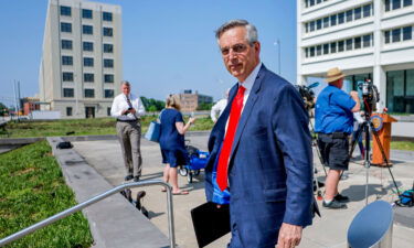 Republican Georgia Secretary of State Brad Raffensperger leaves after a news conference outside the Richard B. Russell Federal Building in Atlanta