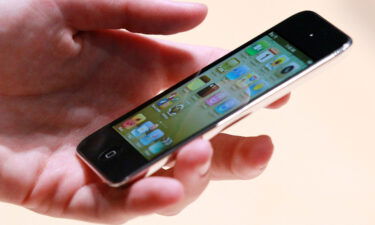 An Apple employee holds a new iPod Touch at an Apple Special Event at the Yerba Buena Center for the Arts September 1