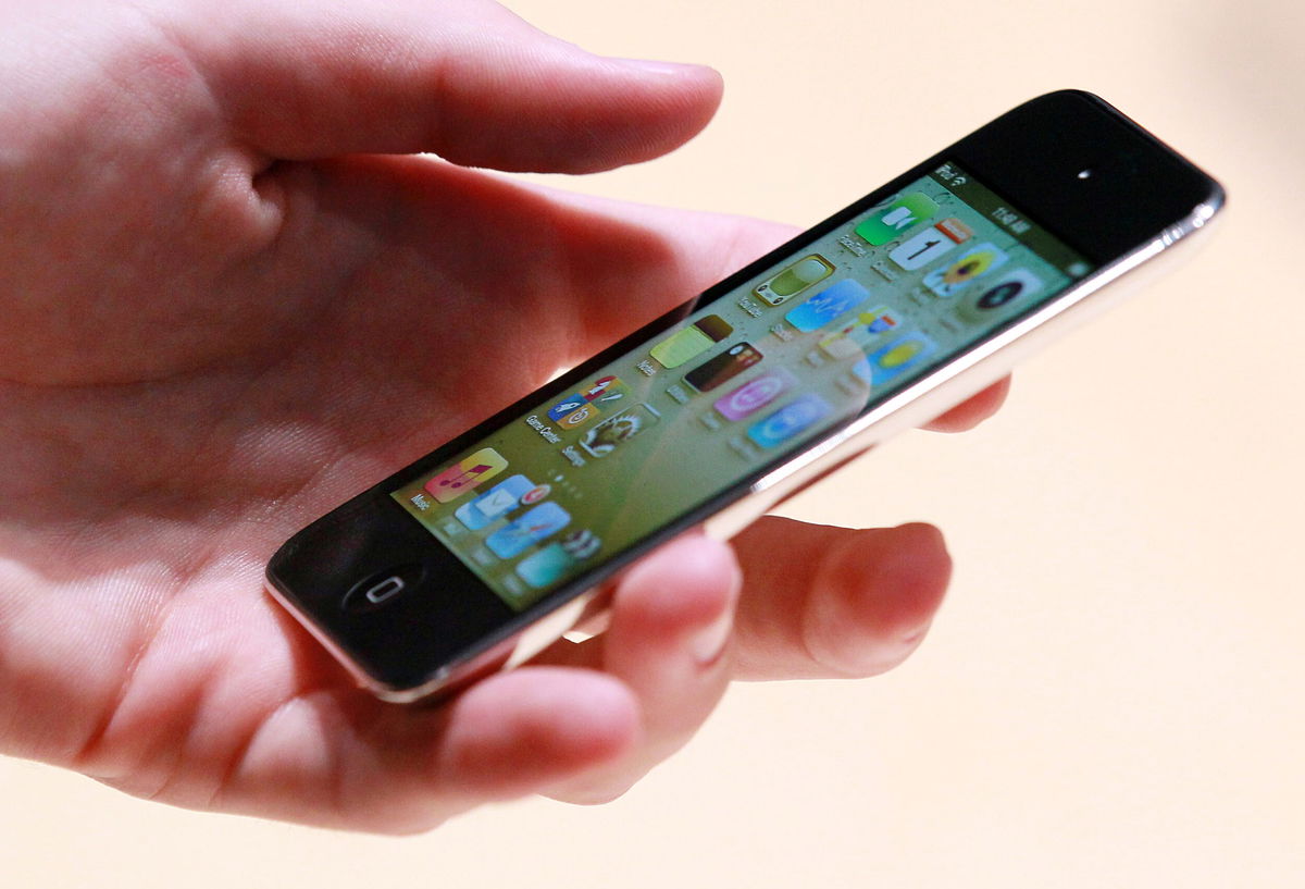 <i>Justin Sullivan/Getty Images</i><br/>An Apple employee holds a new iPod Touch at an Apple Special Event at the Yerba Buena Center for the Arts September 1