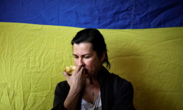 A Ukrainian woman from Mariupol sits at a registration center for internally displaced people in Zaporizhzhia