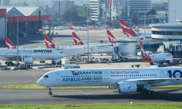 An Airbus A350-1000 flight test aircraft arrives at Sydney airport to mark a major fleet announcement by Australian airline Qantas on May 02