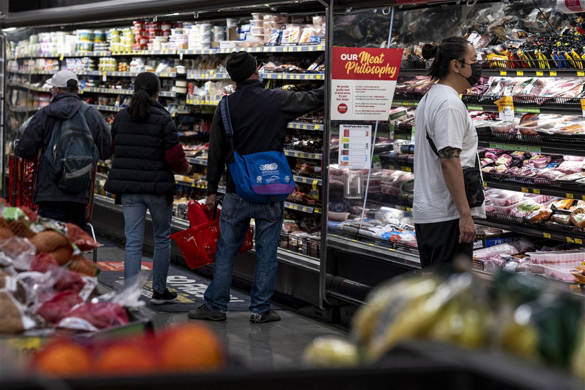 Inflation rates have been increasing sharply since August 2021 and have been out of the normal 2%-to-4% range for a full year, and pictured, shoppers inside a grocery store in San Francisco, California, on May 2.