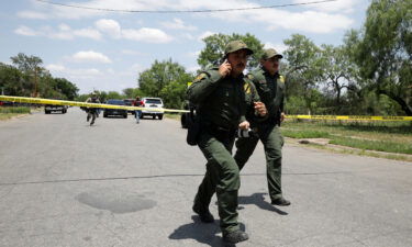 Law enforcement personnel near the scene of the shootings at Robb Elementary School in Uvalde