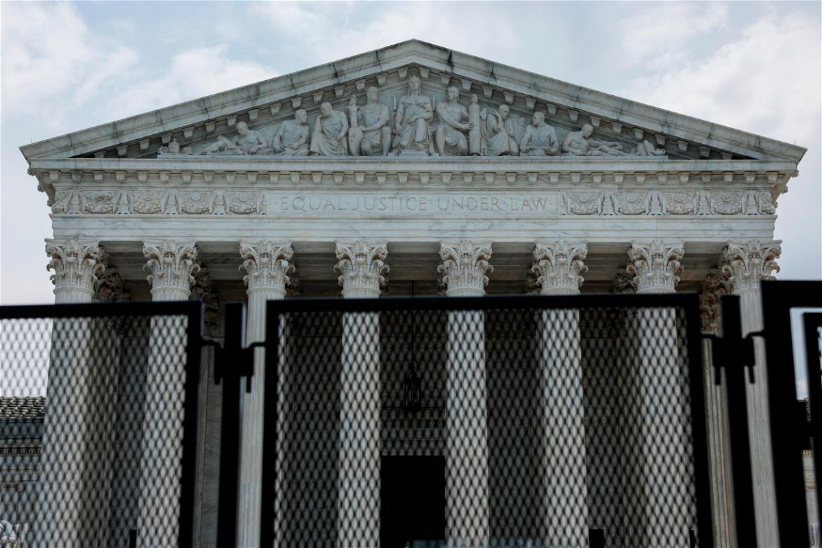 <i>Anna Moneymaker/Getty Images</i><br/>The U.S. Supreme Court Building is seen behind a temporary security fencing on May 20 in Washington