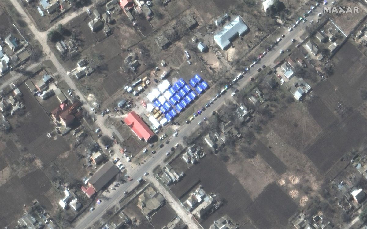 <i>Maxar Technologies</i><br/>Maxar satellite images show the tent camp in Bezimenne on March 22.