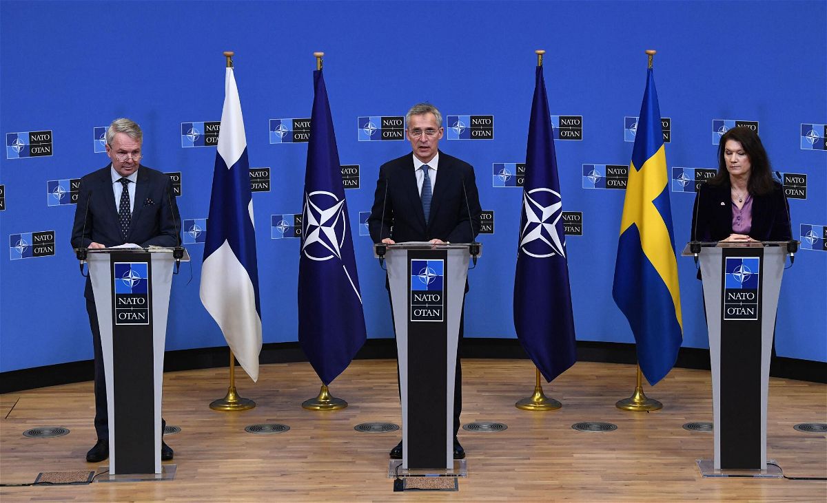 <i>John Thys/AFP/Getty Images</i><br/>NATO Secretary General Jens Stoltenberg (C)