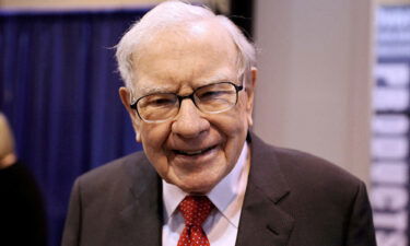 Berkshire Hathaway Chairman Warren Buffett walks through the exhibit hall as shareholders gather to hear from the billionaire investor at Berkshire Hathaway Inc's annual shareholder meeting in Omaha