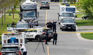 Toronto Police shot and injured a suspect who was walking down a city street carrying a gun.