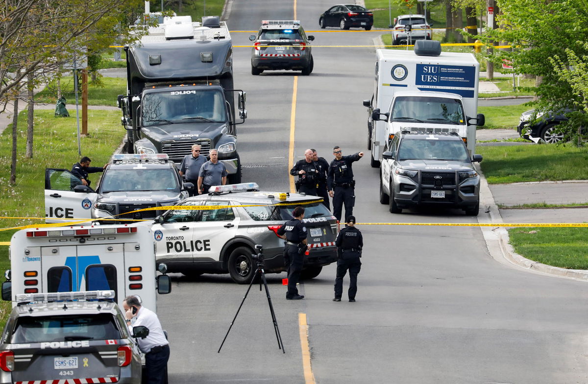 <i>Chris Helgren/Reuters</i><br/>Toronto Police shot and injured a suspect who was walking down a city street carrying a gun.