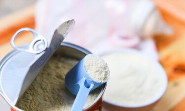 Seen here is milk powder in a spoon.